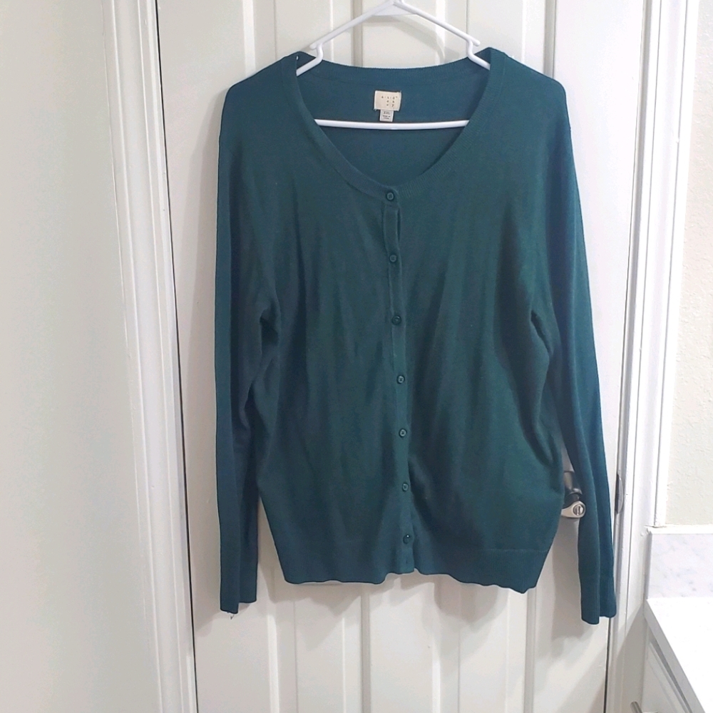 Green button up sweater